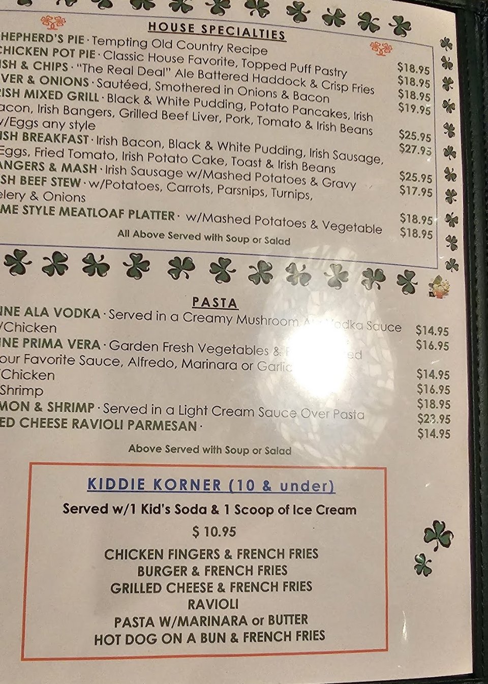 Restaurant menu layout with salads and side dishes.